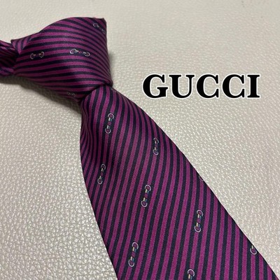 Gucci tie, GG pattern, striped, dotted, checked, red color.