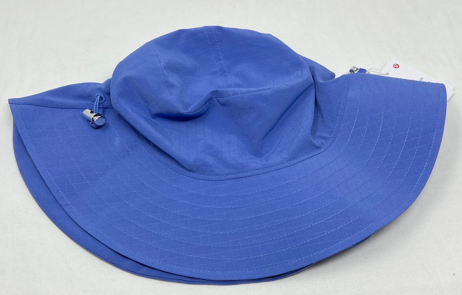 NWT Lululemon Cinchable Wide Brim Bucket Hat Size S/M Wild Indigo eBay