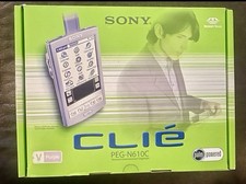 Sony Clie PEG  N610C  V-Purple Rare  DIY- Charges but does NOT power on.