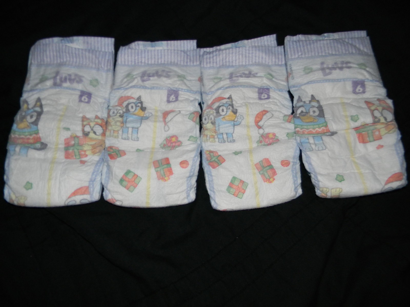 4 sample Luvs Paw Patrol platinum protection Size 6 over 23-44+Lbs.