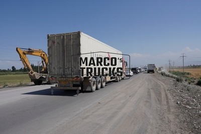 LKW Foto Sitrak Container-Sattelauflieger Kirgisistan rot HAMBURG SÜD #w2gl