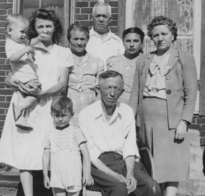 1940s Family Portrait Baby Boys Brick House Outdoor Scene Multiple Generations