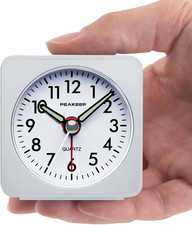 Ultra Small, Battery Travel Alarm Clock with Snooze and Light Silent No Tickin