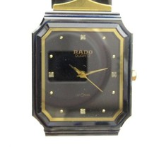 Reloj de cuarzo Rado DiaStar 132.9506.3 esfera negra 4 piedras tono dorado damas vintage