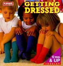 Getting Dressed: Tab Board Book (Tab Board Books) by Playskool