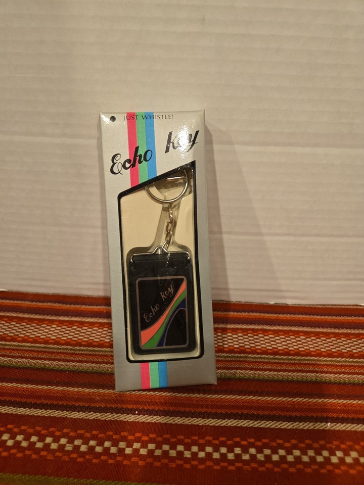 A deadstock 1980s Echo whistle key finder — a genuinely quirky, functional gadget that looks like it time-traveled from a spy movie.