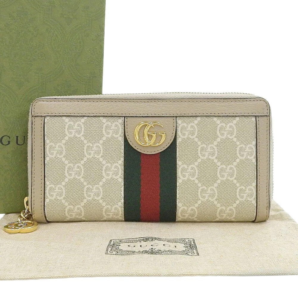 Gucci GG Supreme Ophidia GG Marmont fermeture éclair ronde GG Supreme beige avec B authentique