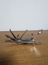 Taschenmesser Multitool silber mit Säge, Schere, Lupe, Einstiger