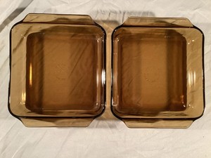 Two vintage Anchor Hocking Fire King 8” square amber glass casserole baking dish