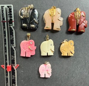 Carved stone elephant pendant collection (vintage)