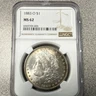 1883 Morgan Silver Dollar $1 New Orleans NGC MS62 Uncirculated Coin
