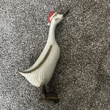 TII Collections 12” Wood Look Duck In Santa Hat Wood Look Resin 