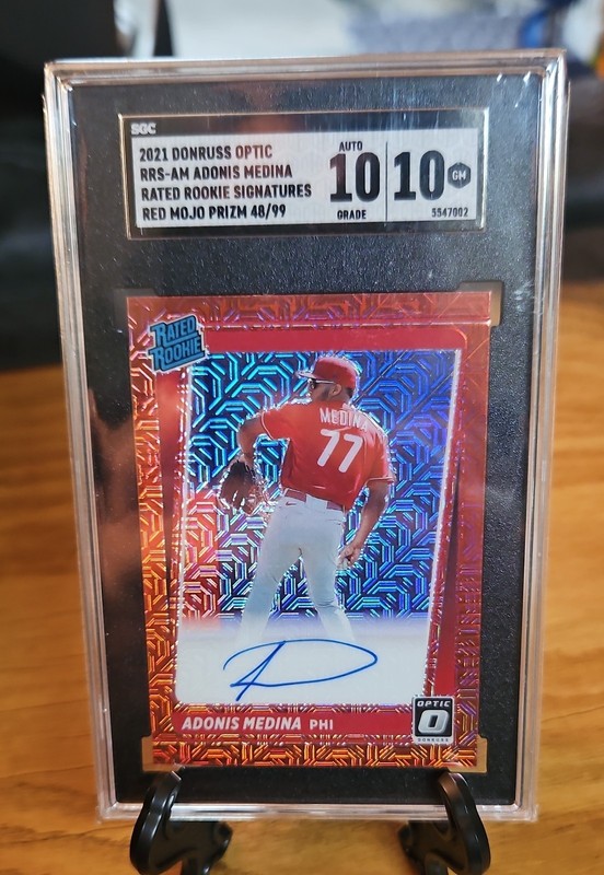 2021 Donruss Optic Rated Rookie  Adonis Medina #RRS-AM Red Mojo Prizm /99 AU, RC