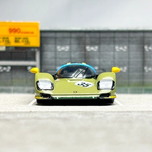Spark 1:64 Porsche 962 auto display edizione limitata rivestimento mimetico modello in lega - Foto 4 di 8