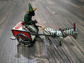 Antique German Lehmann Tin Wind Up Dare Devil Man On Zebra Cart Toy