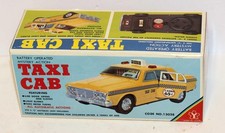 VINTAGE BATTERY OPERATED MYSTERY ACTION TAXI CAB TOY   MADE IN JAPAN   PRISTINE