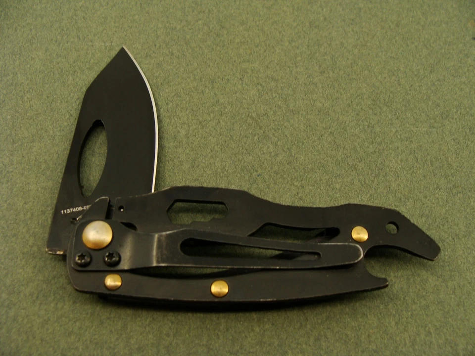 NAVAJA DE BOLSILLO PLEGABLE G10 MULTIHERRAMIENTA GADGET ORO NEGRO SMITH&WESSON HERRAMIENTAS Foto 2 de 4