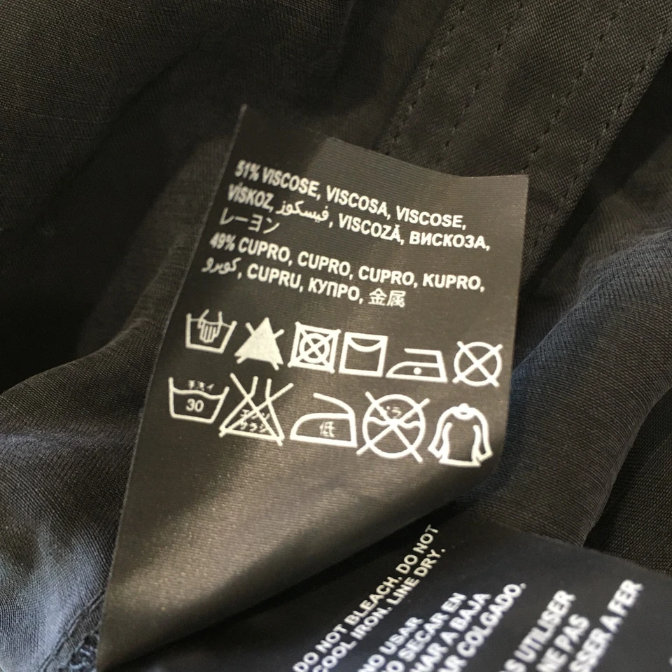 NUEVO CON ETIQUETAS BEBE Mameluco de una pieza negro suave manga corta con puños para mujer talla pequeña Foto 3 de 4