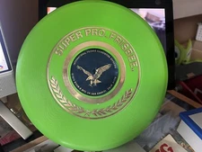 Wham-o Frisbee Rare green super pro no mold slightly used  Eagle label 1976