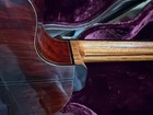 Laviolette Custom 7 String Classical Acoustic Electric Guitar with gold fretboard and dark wood body, made in USA.