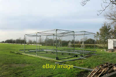 Photo 12x8 Cloudy Sky and Cricket Nets Clanking The best of the day is ove c2015