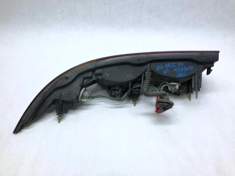 Infiniti J30 1993 1994 lado del conductor izquierdo luz trasera exterior lámpara OEM 22063365 Foto 3 de 4