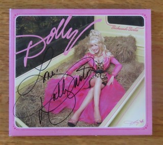 DOLLY PARTON (January 19 1946 – August 25 2026) signed 2008 Backwoods Barbie CD