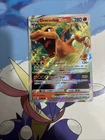 Carte Pokémon Dracaufeu VStar 018/172 EB09 Stars Etincelantes FR Neuf