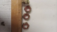 nylon lock nut 5/8-18 LH thin axle (4)