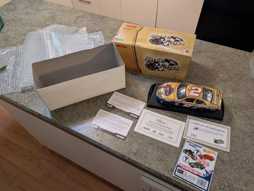 2004 Rusty Wallace #2 2005 Charger 1/288 Autographed 1:24 Gold Diecast Car w COA