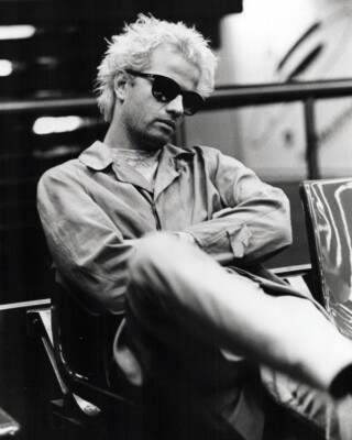 Christopher Lambert seated in sunglasses from Subway 24x30 Poster