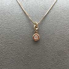 GIROCOLLO RECARLO, punto luce con diamante ct 0,145 e oro rosso 18 Kt ( 750 )