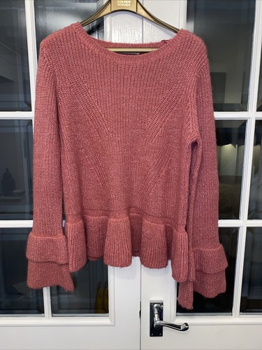 pink frilly jumper