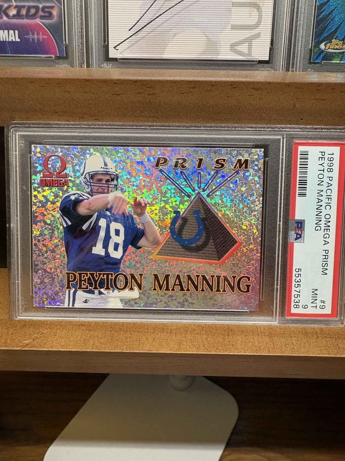 1998 Pacific Omega Prism Peyton Manning #9 RC Colts PSA 9 (pop 5 only 3 higher!) view 1
