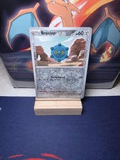 Bronzor 126/191 Sv08: Surging Sparks Reverse Holo