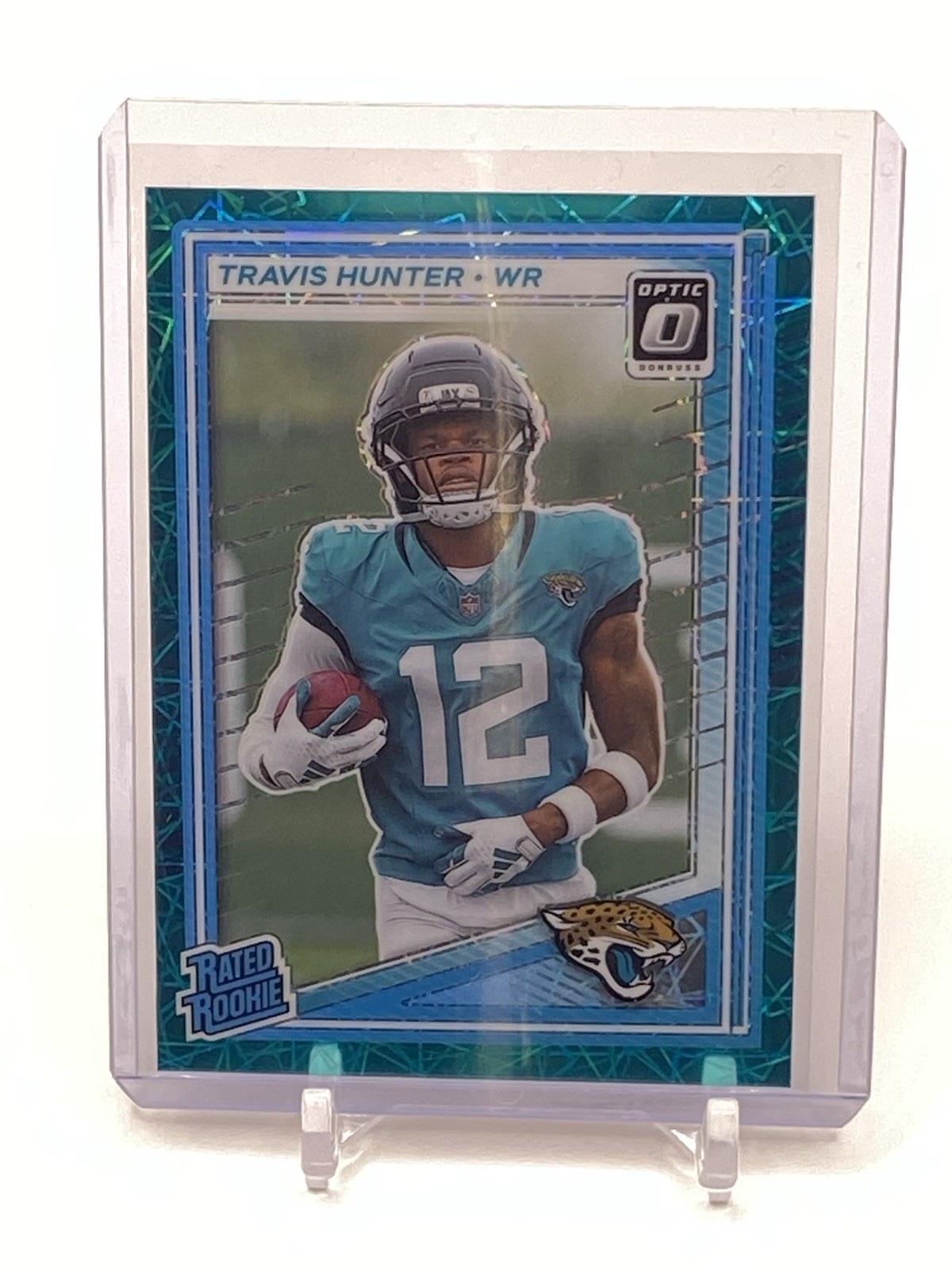 2025 Panini Donruss Optic Travis Hunter Rated Rookie Teal Velocity Prizm #201