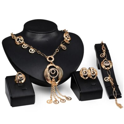 A Gold Tone Five Pieces Jewelry Set