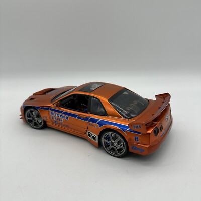 Muscle Machines Import Tuner 1/18 Scale 2000 Orange Nissan Skyline