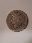 1922 S and 1923 S (?) Peace dollars
