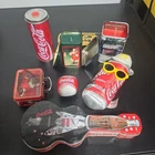 Vintage lot of Coca-Cola tins and miscellaneous items. 8 Items
