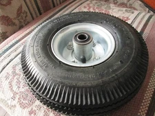 10 inch inflatable rubber tire w rim / wheel 3.50/10   5/8 and 1/2 center holes