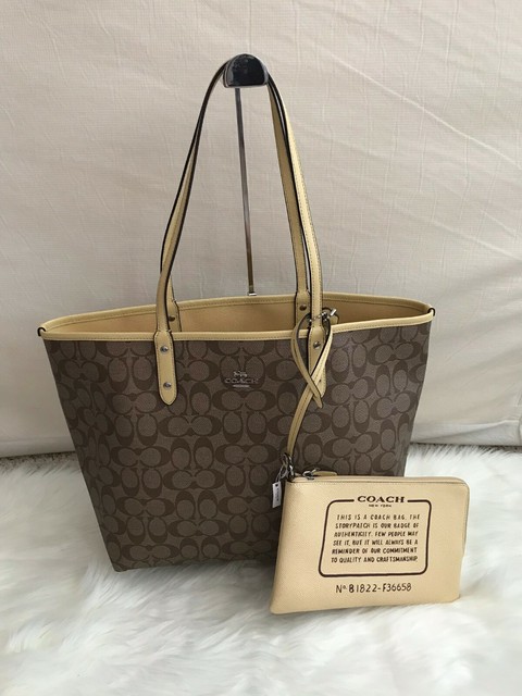 reversible city tote in signature canvas