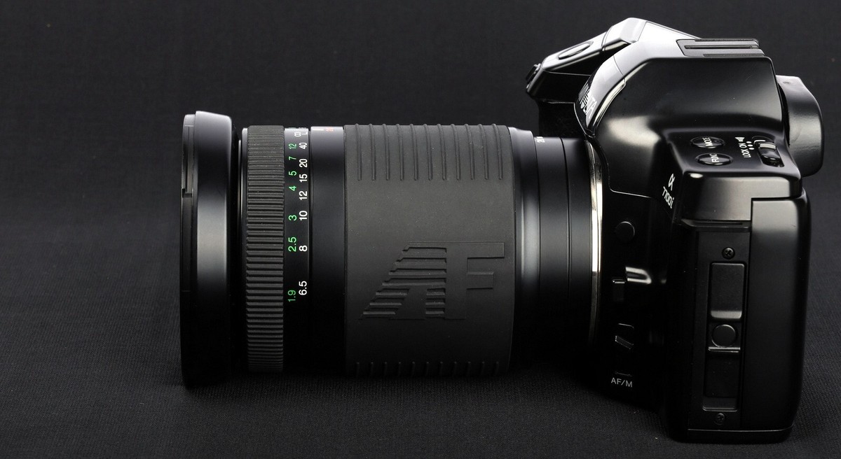 MINOLTA  α7700i Minolta Alpha 7700i - Get info on features, films & batteries