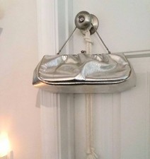 Unique silver vinyl evening bag with a kiss clasp from 1950/1960's era
