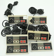 Lot of (6) Official OEM Nintendo NES Controllers NES-004