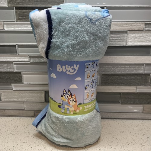 New Bluey & Bingo Tumbling 40" x 50" Blue Plush Rolled Travel Throw Blanket
