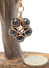 Copper Wire Wrapped 5-point Star Pendant With Arfvedsonite 8mm Beads Copper Wire Wrapped 5-point Star Pendant With Arfvedsonite 8mm Beads