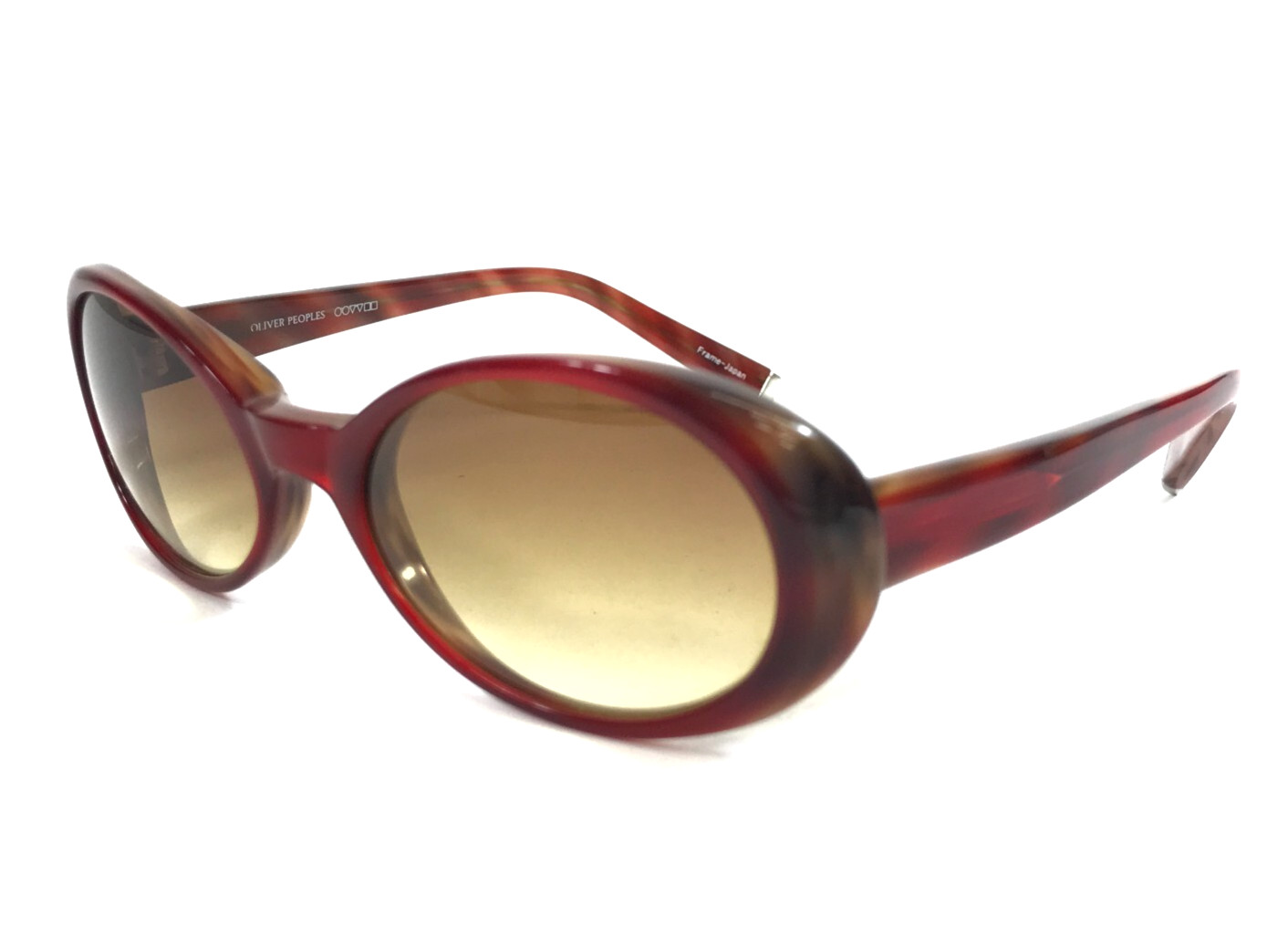 Солнцезащитные очки Oliver Peoples в матовой красно-коричневой оправе с коричневыми градиентными линзами 45090₽