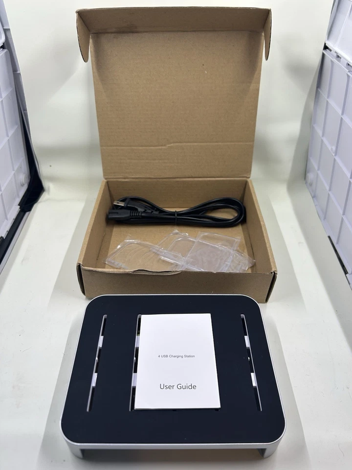 Estación de carga USB de 4 puertos - Organizador de cargador multidispositivo - Plateado y negro Foto 2 de 4