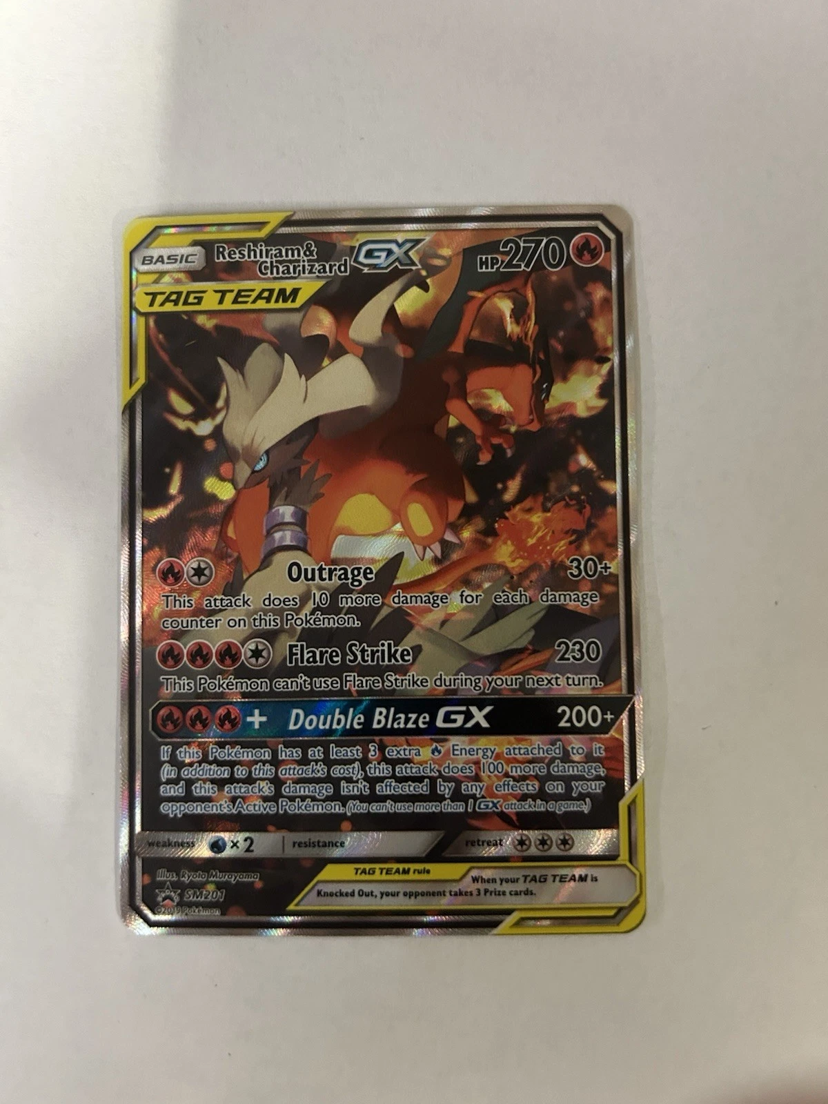 Deal for Reshiram & Charizard GX SM201 Sun & Moon Black Star Promo SM Holo Pokemon